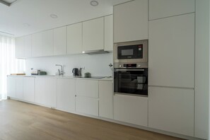 Private kitchen - Gorgeous 3-bedroom apartment, utmost comfort & convenience at historic Barcelos. (Barcelos)