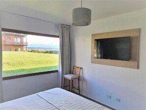 1 habitación, acceso a internet y ropa de cama