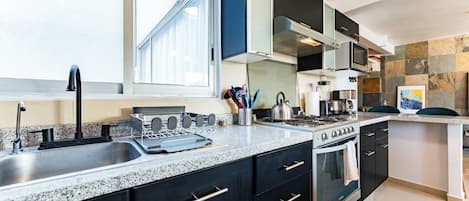 Departamento Deluxe, 5 habitaciones | Cocina privada