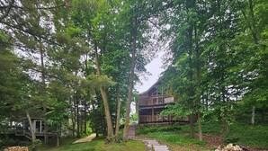 Property grounds - Spacious Lakefront Getaway-3BR+Loft, private dock, kayaks/canoe & cozy Fire Pit. (Turtle Lake)