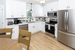 Fridge, microwave, oven, stovetop - Renovated 5-bedroom house in Minneapolis, Richfield. (Minneapolis)