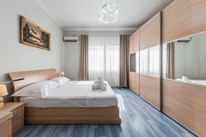 1 غرفة نوم ومكواة/لوح كي وواي فاي مجانًا وملاءات أسرّة