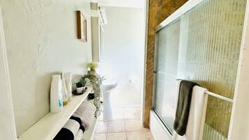 Hair dryer, towels, soap, shampoo