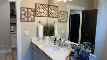 Hair dryer, towels, soap, shampoo