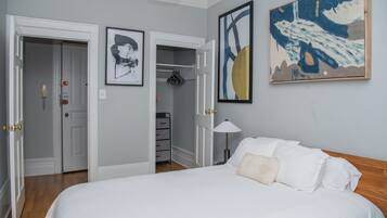 1 bedroom, desk, iron/ironing board, travel cot