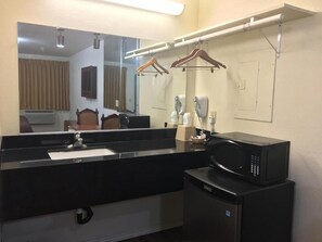 Combined shower/bathtub, towels, soap, shampoo