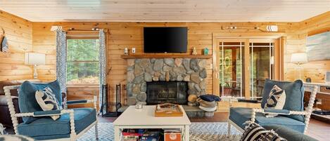 Smart TV, fireplace, foosball, books