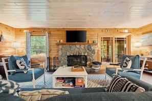 Smart TV, fireplace, table football, books