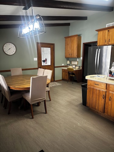 Spacious 5-bedroom log cabin home with 2 ponds and 50 acres just outside Moberly