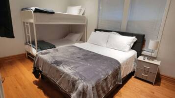 2 bedrooms, desk, iron/ironing board, travel crib