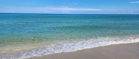 On the beach, sun-loungers, beach towels