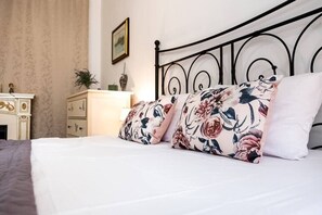 2 dormitorios, tabla de planchar con plancha, cuna de viaje y wifi