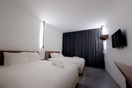 Deluxe Quadruple Room, Multiple Bedrooms, Non Smoking | Desk, free WiFi. T Hotel Jalan Sultanah