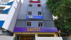 A hotel building with a sign for 'fab hotels' and 'SALTEL' on the facade. - Fabhotel Saltel (Kolkata)