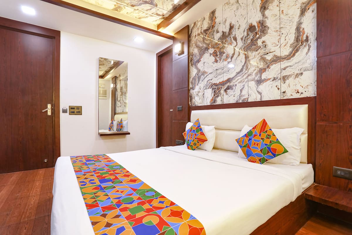 Deluxe kamer | Lakens van Egyptisch katoen, luxe beddengoed, een kluis op de kamer