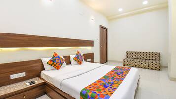 Habitación Deluxe | Sábanas de algodón egipcio, ropa de cama de alta calidad, caja fuerte