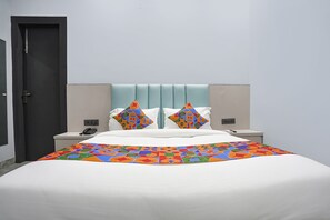Habitación Deluxe | Sábanas de algodón egipcio, ropa de cama de alta calidad, caja fuerte