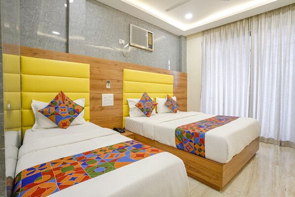 Egyptian cotton sheets, premium bedding, in-room safe, free WiFi - Fabhotel National (Mumbai)