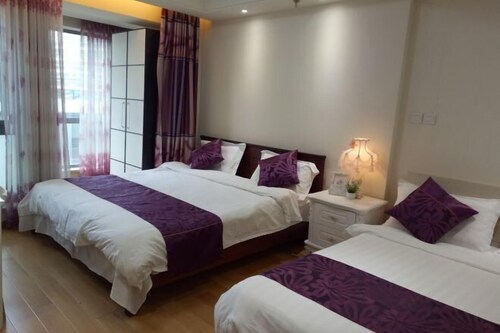 Huacai Apartment Hotel (Beijing Qilinshe)