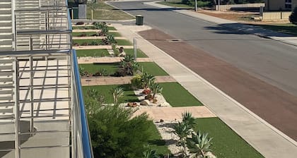 Beautiful modern three bedroom townhouse walking distance to the beach.