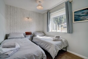 2 quartos, ferros/tábuas de passar roupa, Wi-Fi de cortesia