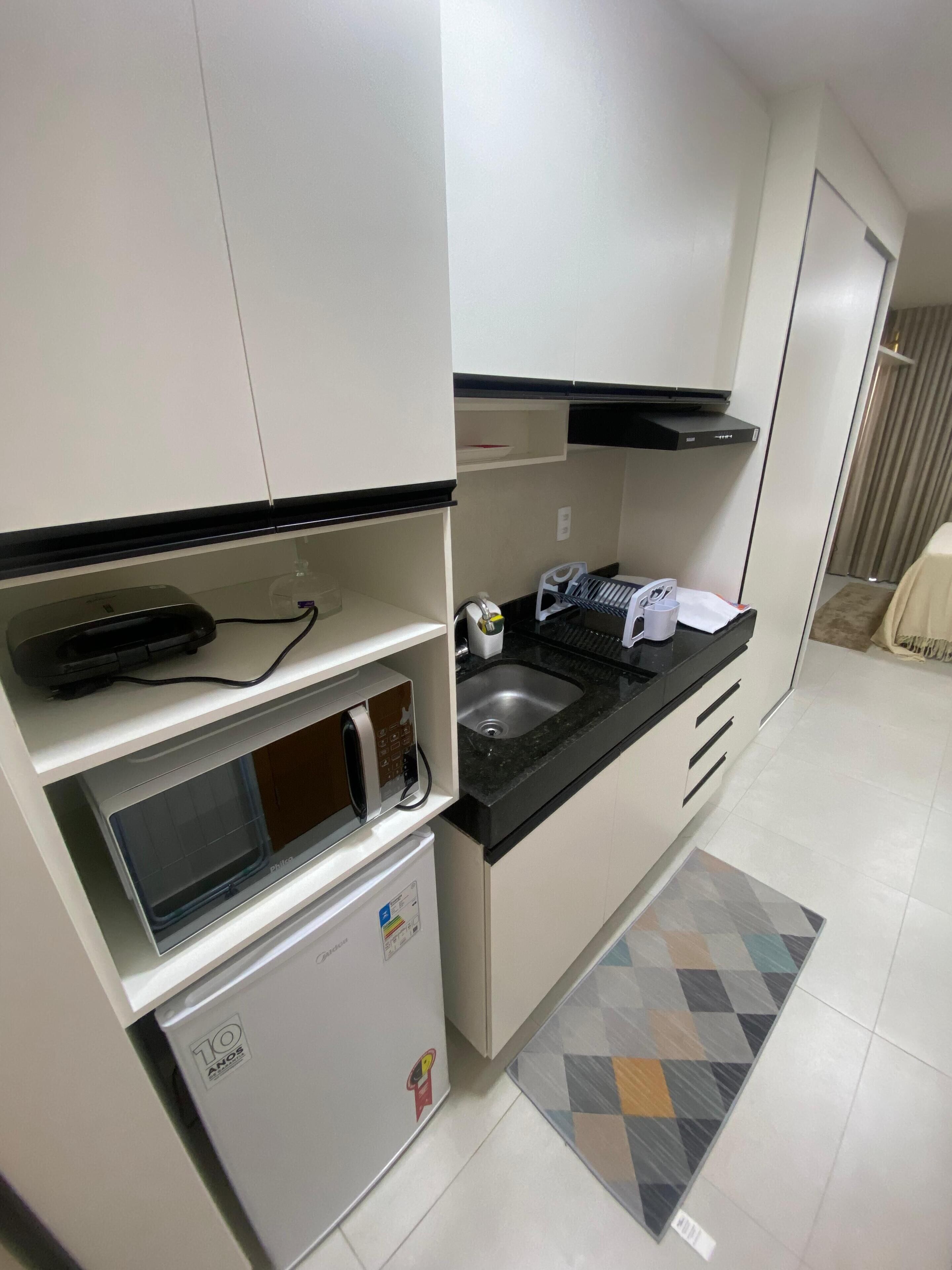 Comfort Studio, Balcony, Pool View | Private kitchen | Mini-fridge, microwave, stovetop, cookware/dishes/utensils