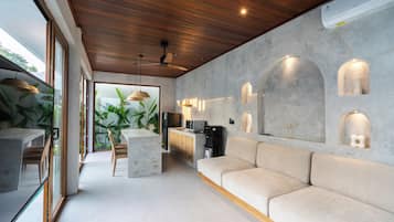 Villa, 1 habitación, para no fumadores, alberca privada | Área de sala de estar | Televisión de pantalla plana
