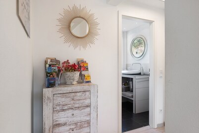 Apartment 'Ferienwohnung Am Bannwald 1' with Private Terrace, Shared Garden and Wi-Fi