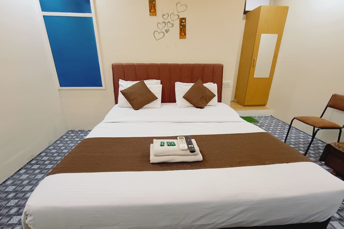 Habitación Deluxe | Escritorio, wifi gratis, ropa de cama