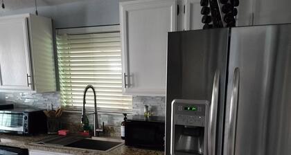 3-bedroom home with AC refrigeration unit, WiFi, garage plus carport.