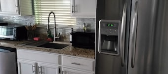 3-bedroom home with AC refrigeration unit, WiFi, garage plus carport.