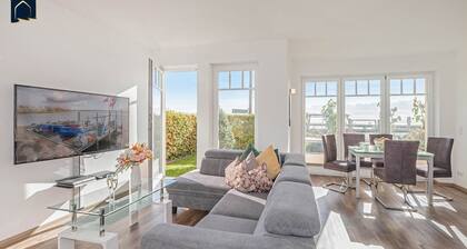 Moderne Ferienwohnung mit Terrasse & Seeblick – nur 350 m zum Haff
