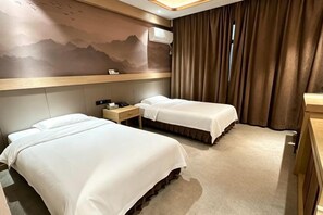 A hotel room with two beds, a nightstand, a wall-mounted air conditioner, and a view of the outdoors through a window with curtains. - Jinhai Hyatt Hotel Linyi (Linzhang)