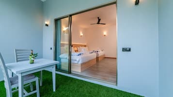 Habitación doble Deluxe, patio, vista al jardín | Terraza o patio