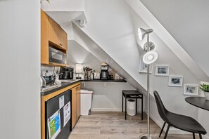 Microwave, stovetop, coffee/tea maker, toaster