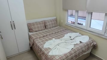 Comfort kamer | Een minibar, beddengoed