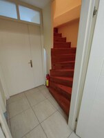 Economy Duplex, City View | Minibar, bed sheets