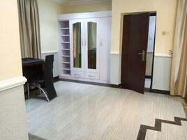 Comfort Room, Balcony, City View | Desk, laptop workspace, free WiFi