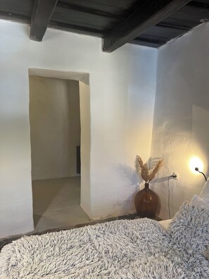 2 slaapkamers, een strijkplank/strijkijzer, beddengoed