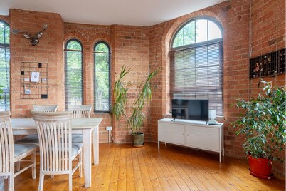 Spacious city apartment, open-plan, converted mill. 5 minutes from city centre.