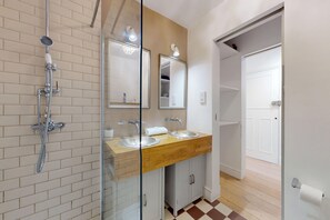 Shower, hair dryer, towels, soap