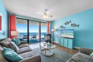 Signature Condo, Balcony, Beach View | Living room | 55-inch Smart TV with cable channels - White Caps 505 (Orange Beach)