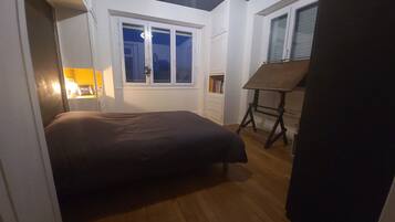 1 chambre, fer et planche Ă repasser, Wi-Fi, draps fournis