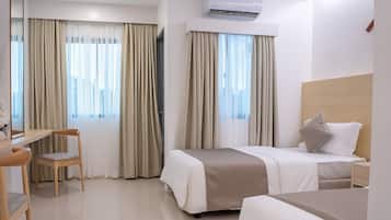 Deluxe Twin kamer | Een minibar, een strijkplank/strijkijzer, gratis wifi, beddengoed