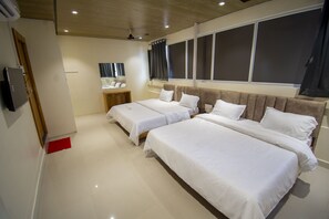 Deluxe Quadruple Room | Free WiFi, bed sheets - Hotel Anubhuti (Ujjain)