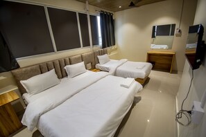 Chambre triple Deluxe | Accès au Wi-Fi (inclus), literie fournie