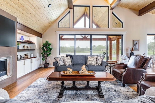 Den has great views, beautiful gas fireplace, Huge Frame TV