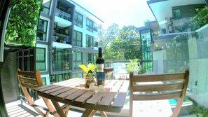 Apartment, 1 Schlafzimmer, barrierefrei, Balkon | Speisen im Freien