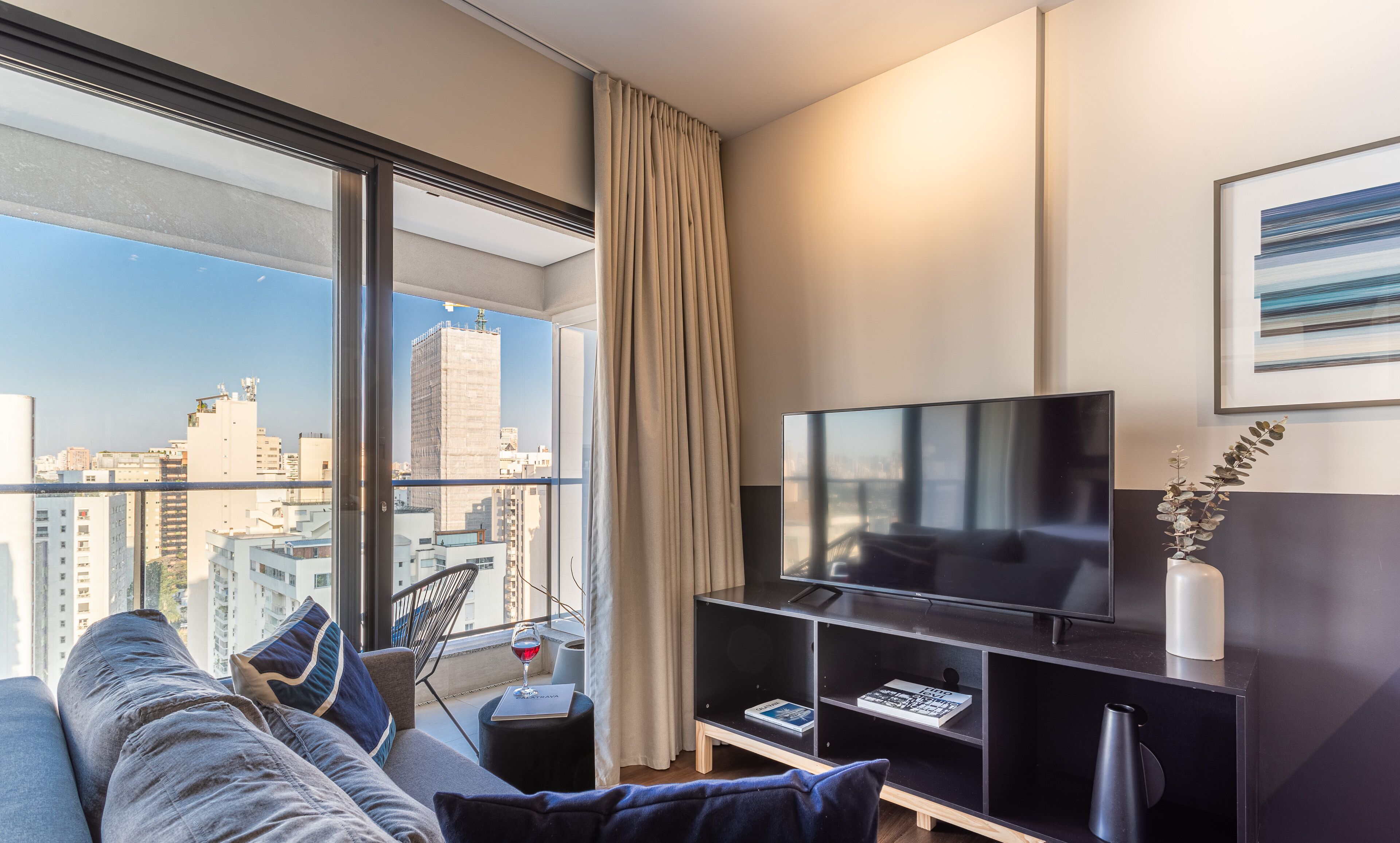 City Studio | Living area | 32-inch TV with digital channels