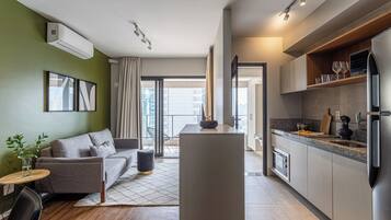 Apartamento júnior | Área de estar | TV 32 polegadas com canais digitais